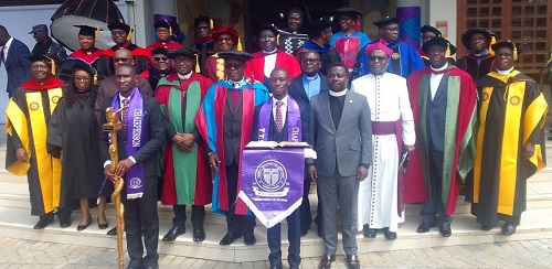 • Rev. Fordjuor (right)with the dignitaries and some of the graduates.