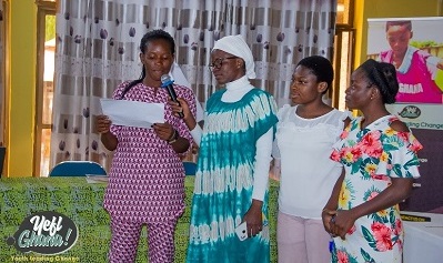 • A participant at the meeting making her presentation