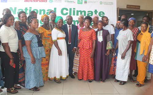 The dignitaries with some women farmers at the event. Photo Godwin Ofosu-Acheampong