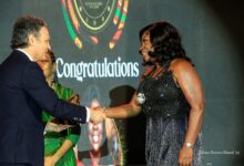 Mrs Obo-Nai (right) receiving her award