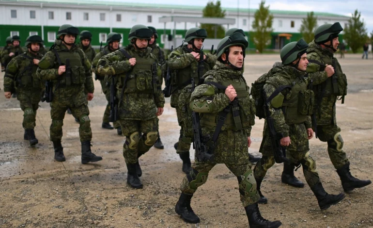 Russian reservists recruited during the partial mobilisation of troops attend a ceremony before departing to the zone of Russia-Ukraine conflict