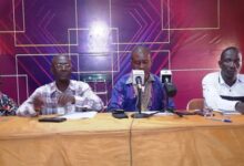 Mr. Adjei addressing the media