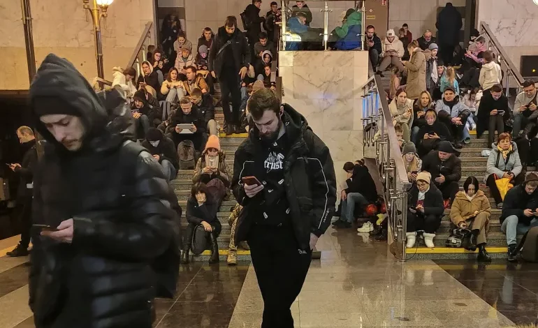 • People shelter inside a metro station during substantial missile attacks on Kyiv
