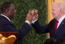 • President Joe Biden (right) proposing the toast at a summit dinner with Senegal’s President Macky Sall