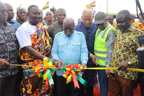 • President Akufo-Addo (inset) cutting the tape to open the facility