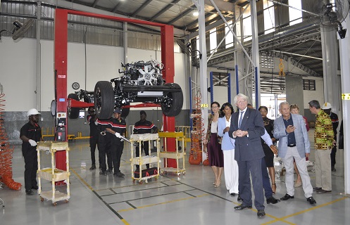 The UK delegation being conducted round the plant by Japan Motors top officials