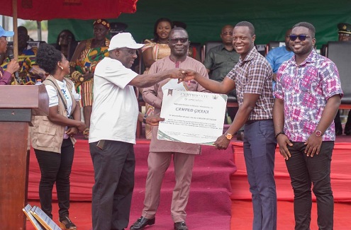 • Mr Kingsley Agyei Boahen (left) presenting a citation to Mr Christian Zico Agbebo while others look on