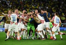 Croatia players celebrating their shoot-out win over Brazil