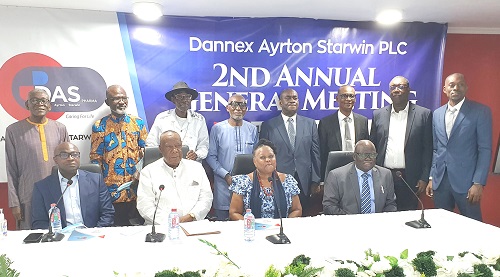 Mr Nik Amartefio(seated second from left) with Management and some shareholders after the meeting. Photo Godwin Ofosu-Acheampong-