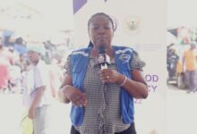 Madam Atupra(inset) addressing the market women