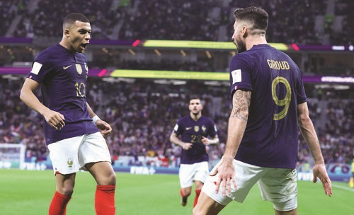 • Giroud and Mbappé celebrating the opener