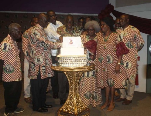 Mr Donkor (second from left) with members of the association cutting the anniversary cake to mark the launch.