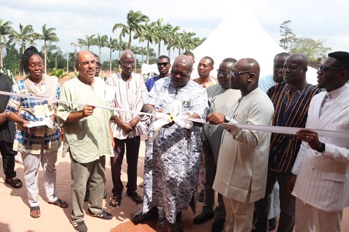 • Otobour Gyan Kwasi II (third from right) Aburihene being assisted by Dr Samir Kalmoni (second from left) with other officials to officially cut the tape to inaugurate the centre