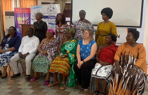 Ms Flynn-Dapaah (seated third right) with other participants