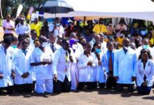 A group of doctors caused a stir after kneeling before President Museveni
