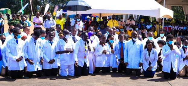 A group of doctors caused a stir after kneeling before President Museveni