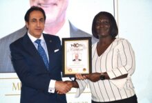 • Elizebeth Owusu Gyebi from Interplast receiving the award from Mr Maher Kheir on behalf of her MD, Mr Hayssam Fakhry.Photo: Vincent Dzatse
