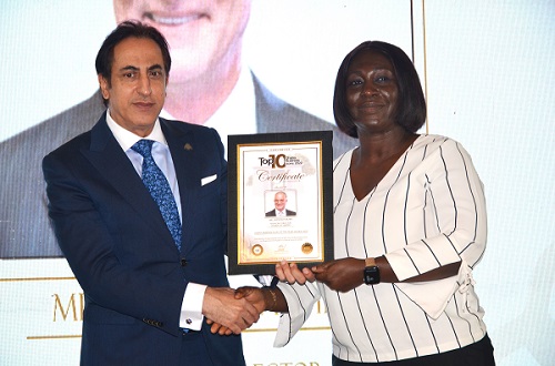 • Elizebeth Owusu Gyebi from Interplast receiving the award from Mr Maher Kheir on behalf of her MD, Mr Hayssam Fakhry.Photo: Vincent Dzatse