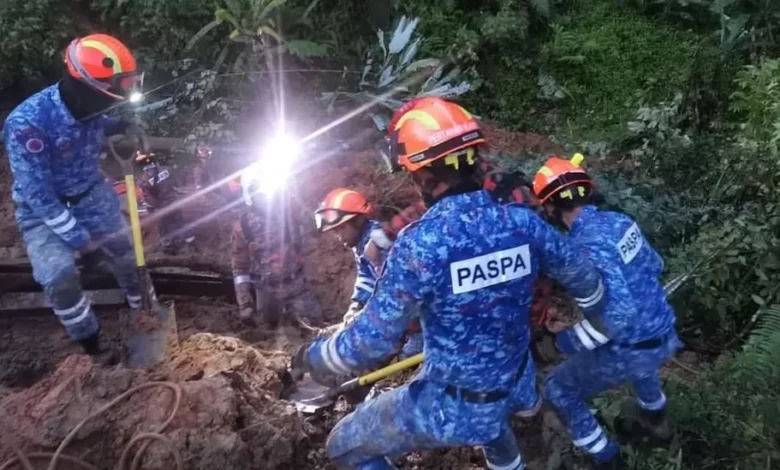 • Rescuers have been shoveling mud to get to the victims feared trapped in the ground