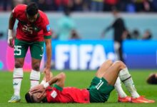 • Morocco's Yahia Attiyat Allah consoles a team-mate at the end of their World Cup semi-final defeat to France