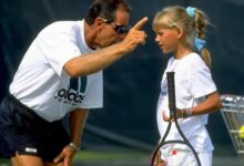 • Nick Bollettieri coaching a young Anna Kournikova