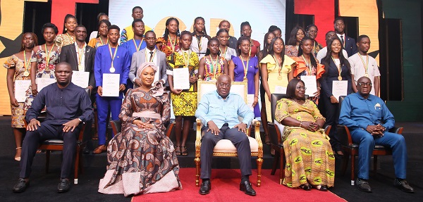 • President Akufo-Addo (middle) with the awardees and other dignitaries after the programme
