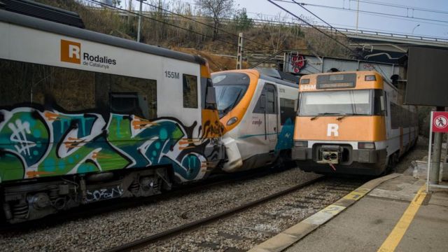 The trains, travelling in the same direction collided while the other was parked at the station