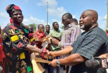• Nana Kwesi Mensah III (left) presenting a petition to Major Kofi Baah-Bentum (Rtd)