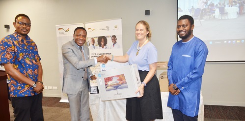 Ms Ariane Von Maercker (second from right) presenting one of the items to Dr Dacosta Aboagye (second form left) with them are other officials. Photo. Vincent Dzatse