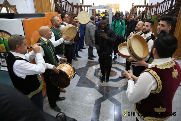 • A traditional musical group welcoming the team to their hotel