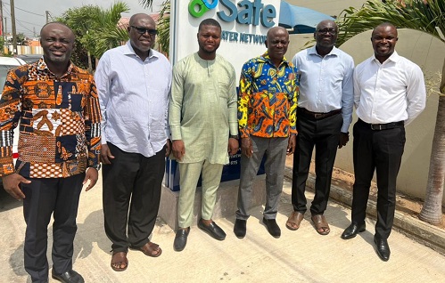 • Mr Boakye (third right) and Mr Aduse Poku (third left) with Mr Nimako (second left) after the meeting