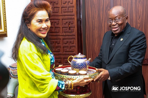 • Dr Singsomboon (left) presenting a gift to President Akufo-Addo