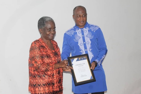 • Ms Ajoa Yeboah-Afari (left) receiving an award from a GAW member