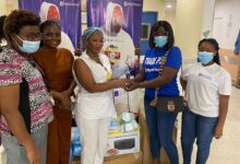 • A worker of Mybitstore presenting the items to nurses at the hospital