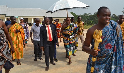 • Inset; Mr Albert Opoku (left) and Nana Asusei Atwenewaa Ampem II walking to inaugurate the facility