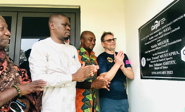 • Mr Mustapha (left), Mr Ashitey and Mr Van Der Weij applauding after a plaque on the facility was unveiled