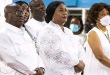 • President Akufo Addo (left) with his wife Rebecca at the 31st watch night service at the Ridge Church in Accra