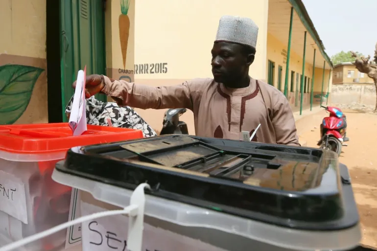 • A man casts his vote during Nigeria’s presidential election at a polling station in Kazaure, Jigawa State, February 23, 2019