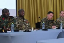 • Colonel William Nortey (left) addressing the media. With him are other military officers