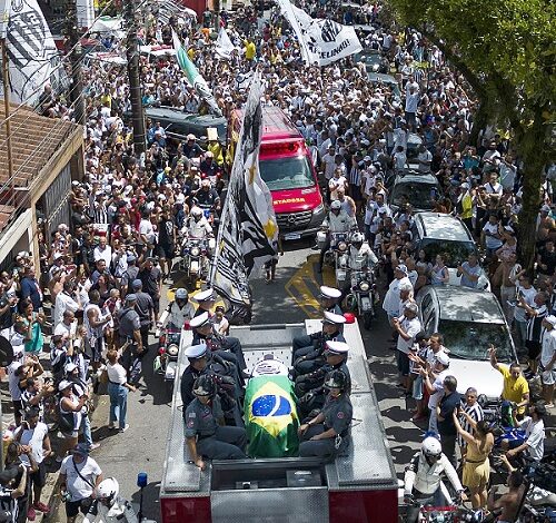 • Casket of Pele draped in the Brazilian and Santos FC soccer club flags as his remains were transported to the cemetery during his funeral procession in Santos