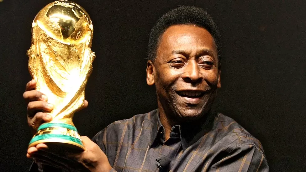 Pele with the World Cup trophy