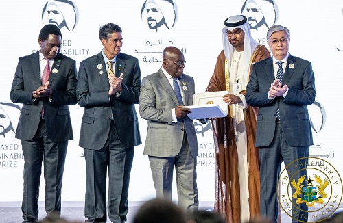 President Akufo-Addo (third from left) receiving a present from the officials of UAE during the Business Forum