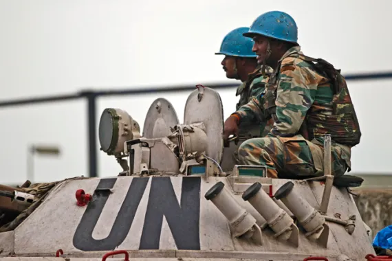• UN peacekeepers from India are seen on board a tank guarding the airport in Goma