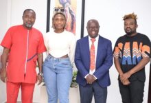 • Wendy Shay flanked by SWAG Capos, Charles Osei Asibey (left), Kwabena Yeboah and management member
