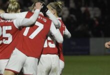 • Arsenal women celebrating their victory over Cit