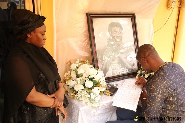 • Late Atsu’s sister looks on as Deputy Youth and Sports Minister Bobbie signs the book of condolence