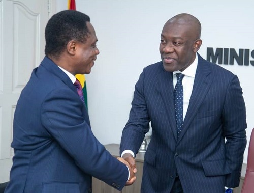 Mr Oppong Nkrumah (right) welcoming Apostle Nyamekye into his office