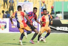 • Flashback: Hearts players flank a Legon Cities player in their clash in Accra. The Phobians would hope to extend their run to Dormaa