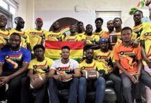 • Mr Nkosi is flanked with players of the Conquering Stars of Ghana