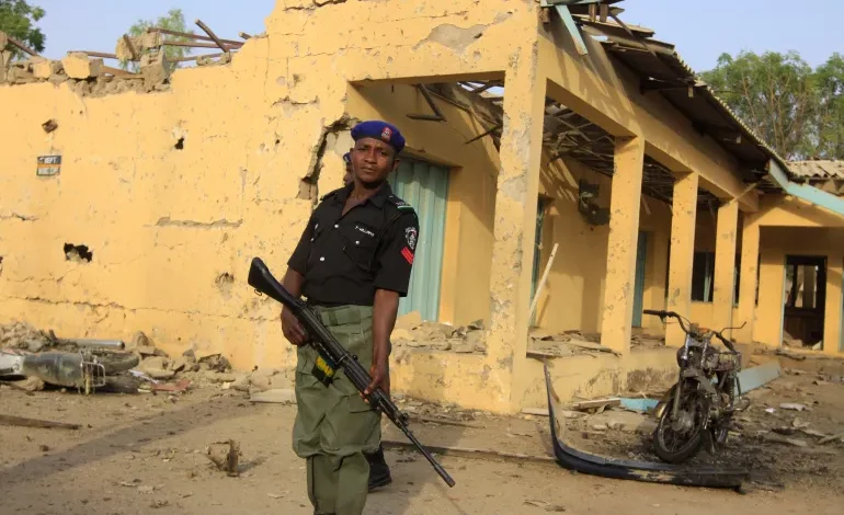 • A police officer stands guard at the site of a suicide bombing